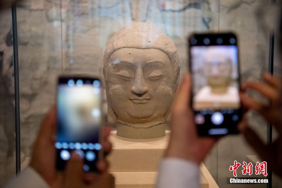 Shanxi: la testa di Buddha in pietra rubata torna a casa