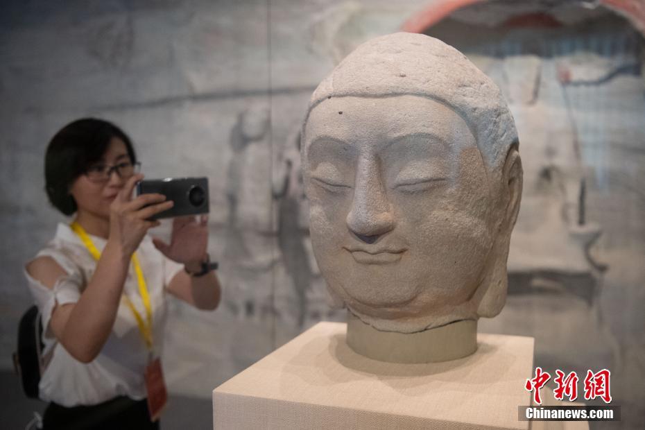 Shanxi: la testa di Buddha in pietra rubata torna a casa