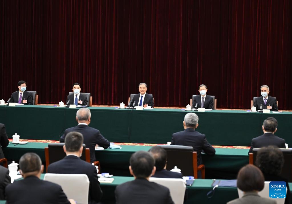 I leader cinesi si uniscono alle discussioni con i consulenti politici