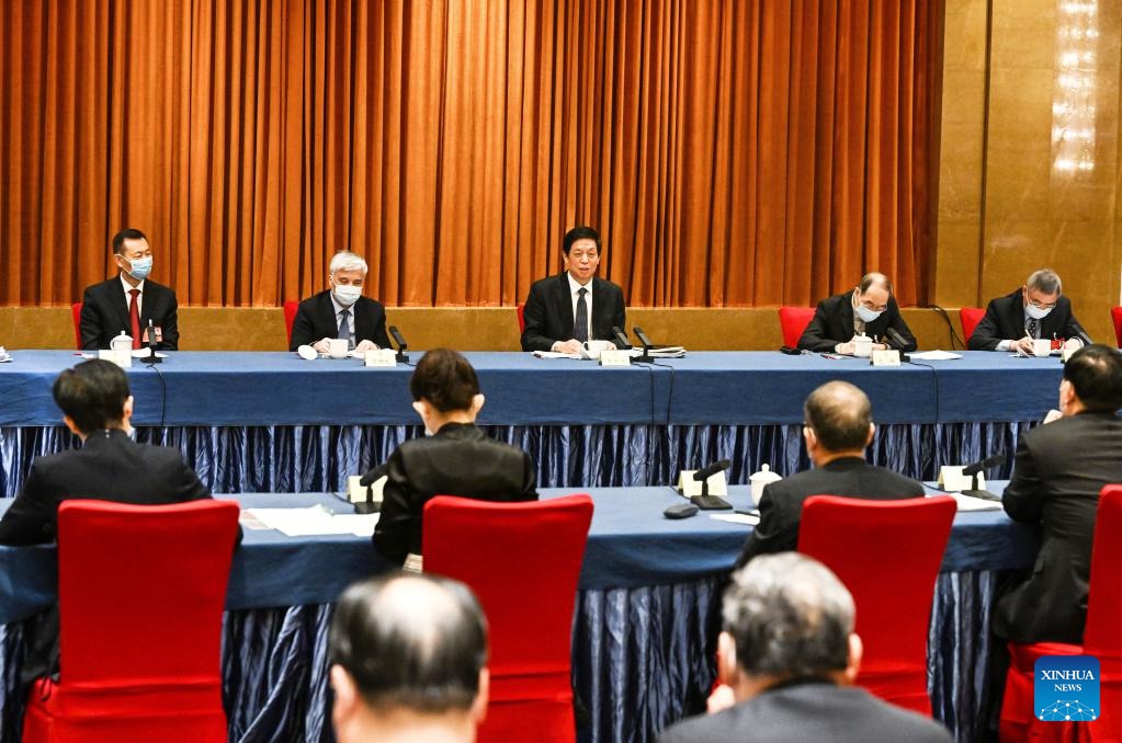 I leader cinesi si uniscono alle discussioni con i consulenti politici