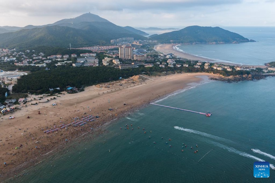 Zhoushan, Zhejiang: turismo estivo stimolato da vari intrattenimenti sul mare