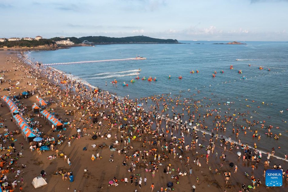 Zhoushan, Zhejiang: turismo estivo stimolato da vari intrattenimenti sul mare