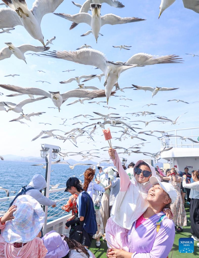 Molte località della Cina entrano nell'alta stagione turistica