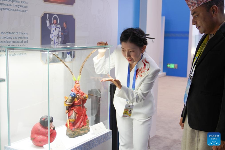 Uno sguardo all'area esperienziale del patrimonio culturale immateriale al centro stampa del Vertice SCO 2025 a Tianjin