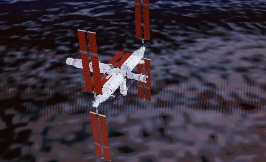 Immagine simulata, catturata presso il Centro di Controllo Aerospaziale di Beijing, mostra la navicella spaziale con equipaggio Shenzhou-21 mentre effettua un rapido rendezvous autonomo e si aggancia alla porta anteriore del modulo centrale della stazione spaziale Tianhe. (Xinhua/Jin Liwang)