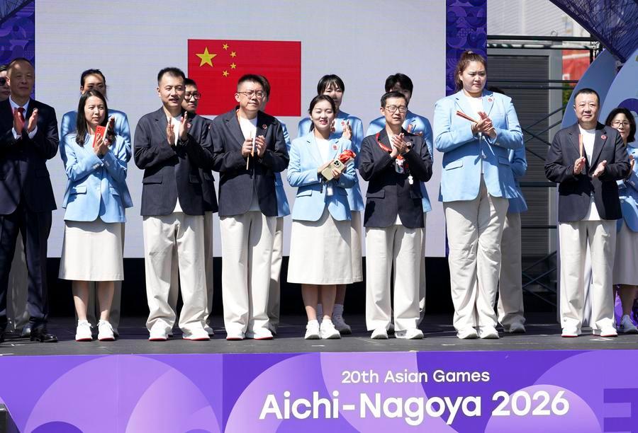 Membri della delegazione cinese partecipano alla cerimonia di benvenuto della squadra per i XX Giochi Asiatici di Aichi-Nagoya 2026. (17 settembre 2026 - Xinhua/Jia Yuchen)